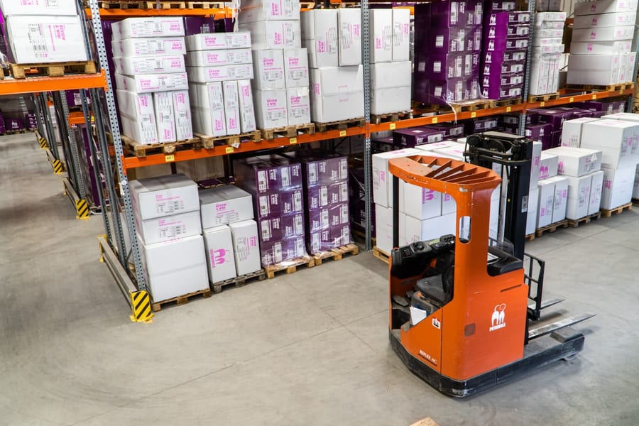Courier carefully packing a secured parcel for express handling